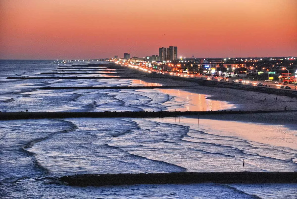 Galveston's seawall and shoreline at sunset